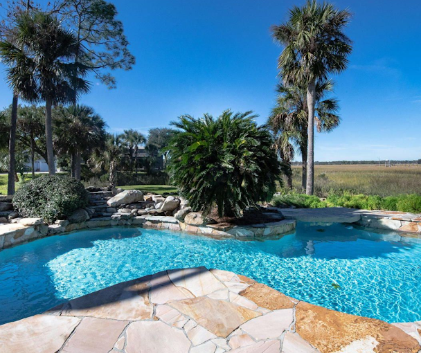 This is a photo of one of Lowcountry Vistas' marquee pool area designs in Mt. Pleasant, SC 29466. It exemplifies Lowcountry Vistas Charleston's native, low-maintenance landscape design philosophy. 